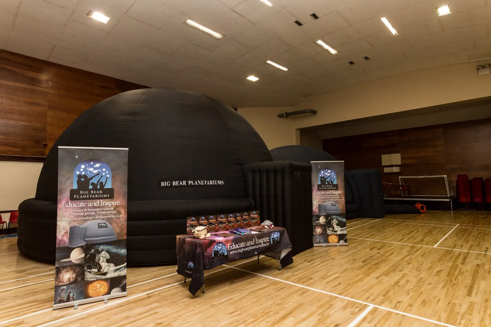 Both Big Bear planetariums set up side by side in a hall